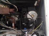 Ariston Clas 24FF Stove: Flow Error 104 - Oven Stops, Cleaning 3/4 Filter, and Black Flakes