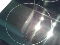 Electrolux EHH6340FXK induction hob blisters under one of the burners