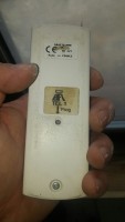 How do I programme a radio motor for roller shutters using a remote control?