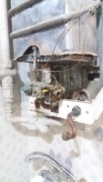 Junkers: Low Pressure & No Hot Water Issue - Cleaning Plastic Filings from Filter (Photos)