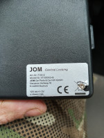 Jak zaprogramować piloty pod centralny zamek firmy JOM?