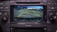Modern backup camera system with dynamic color-changing boundary lines—components and tech?