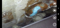 What Causes Sediment Deposits on Copper Pipes in a Central Heating System?