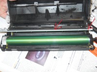 OKI MB491 - po dosypaniu proszku pionowe paseczki cz.b.