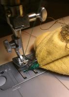 Archer 884 - The machine tangle the threads from the bottom, sews loosely