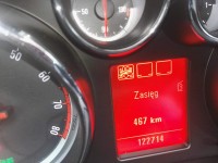 Jak rozpoznać nieznane kontrolki w Oplu Insignia 1.8?